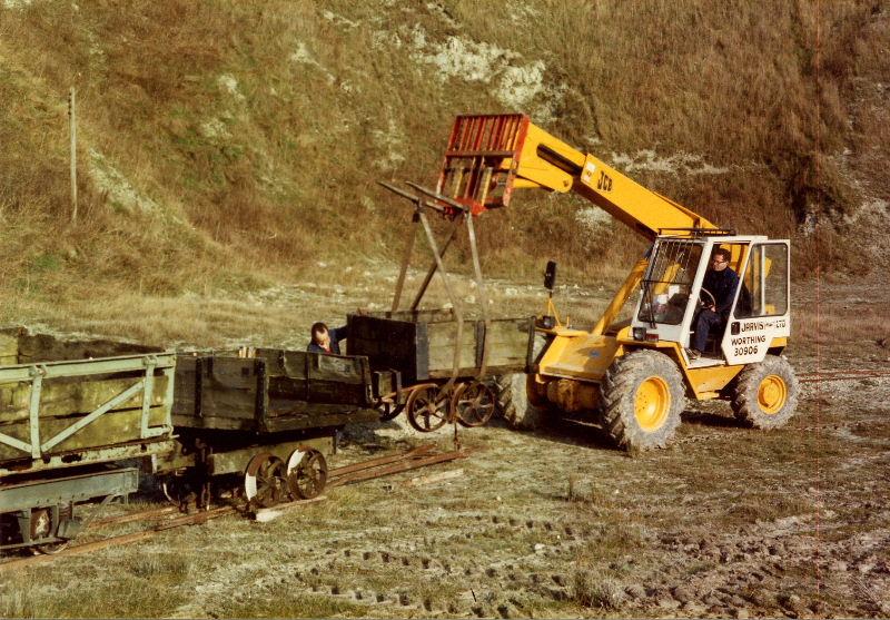 arrivals2.jpg - The two Betchworth wagons are carefully manoeuvred onto some temporary track panels.