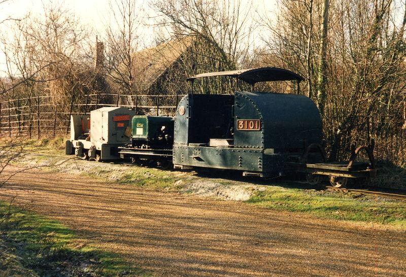 mr1381.jpg - These three locos basking in the winter sunshine are the Protected Simplex, the Chichester City Sewage Works Hibberd, a rebuilt Motor Rail loco, and Orenstein & Koppel loco "The Major" - named after Major Taylorson, MD of the Betchworth quarries from whence the loco came.